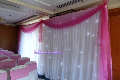 Starcloth back drop and table skirt hire