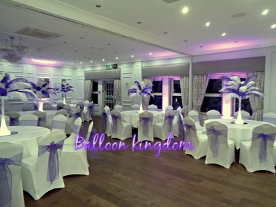 purple and white ostrich feather centerpiece hire at burnham beeches hotel