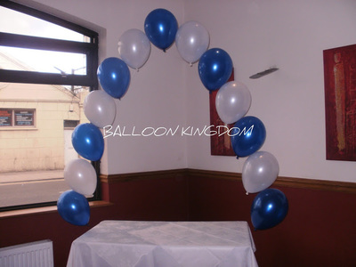 cake table pearl balloon arch 