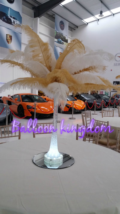 gold and white ostrich feather centerpiece hire