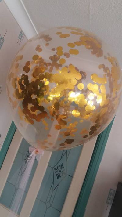 24" metallic gold confetti balloon.