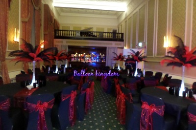 red and black ostrich feather centerpiece hire
