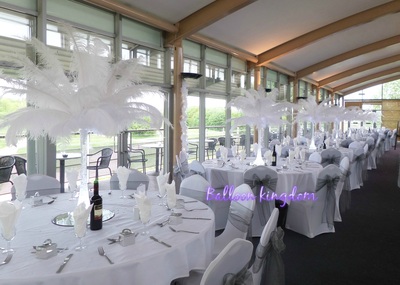 white ostrich feather centerpiece hire at stockley park golf club