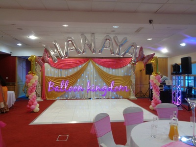 pink gold and silver balloon columns with name arch at bayliss house 