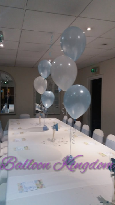 baby blue and white balloons