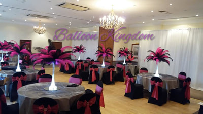 black and Fuchsia pink ostrich feather centerpieces at the ship hotel weybridge 