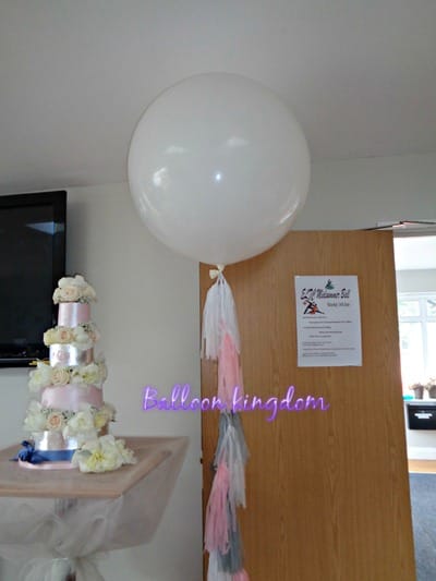 giant balloon with tassel tails