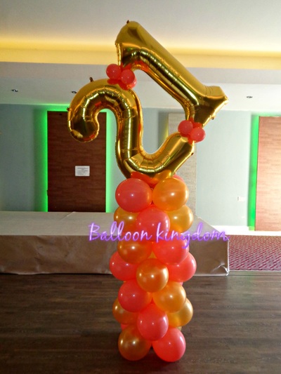 gold and coral balloon column with double number on top
