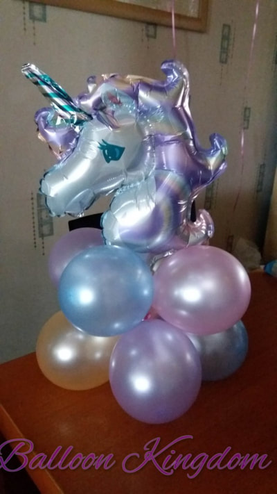 pastel unicorn balloon centerpiece