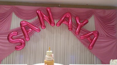 pink foil balloon letter name arch
